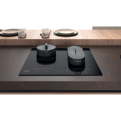 Plaque induction HOTPOINT HB4860BNE : 4 foyers dont 1 zone Combi Duo, My Menu et 4 boosters